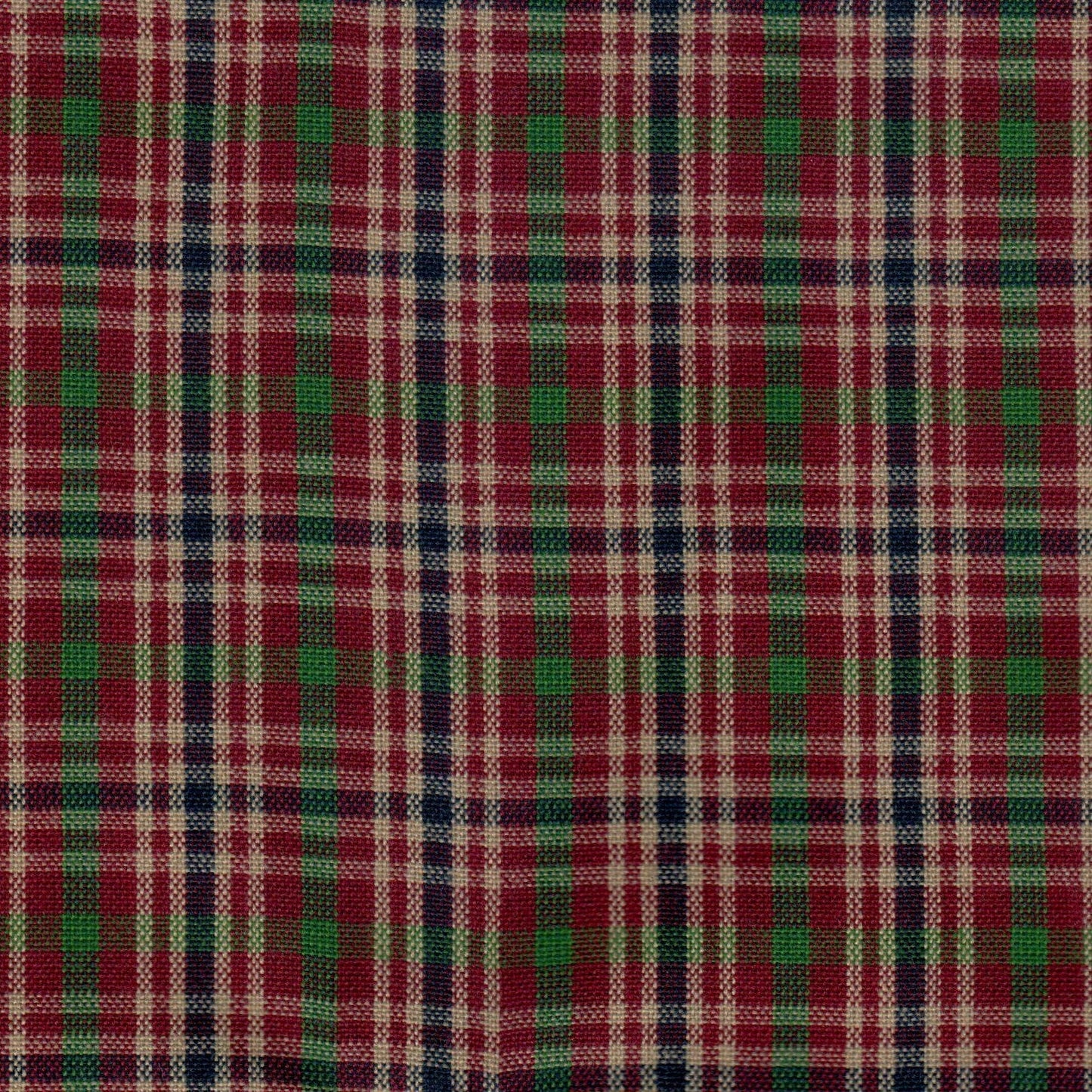 Tela Dacron SchoolLine; tejido a cuadros rojo, verde y crema en tartán para uniformes escolares e institucionales.