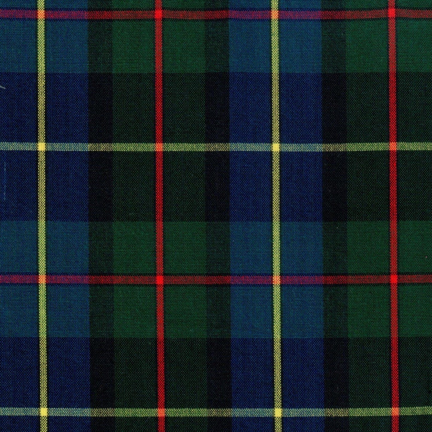 Tela SchoolLine Dacron; poliéster azul y verde con líneas rojas y amarillas, diseño tartán para uniformes escolares e institucionales.