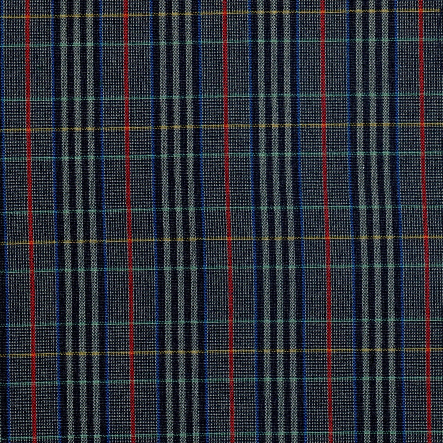 Tela de poliéster Dacron SchoolLine para uniformes escolares; diseño a cuadros azul marino con líneas rojas y acentos verdes y amarillos.