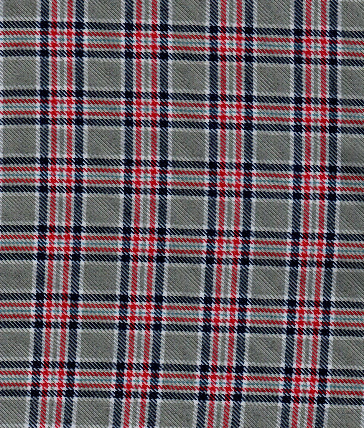 Tela diagonal de poliéster SchoolLine; plaid rojo, azul y blanco sobre gris, apta para uniformes escolares e institucionales.