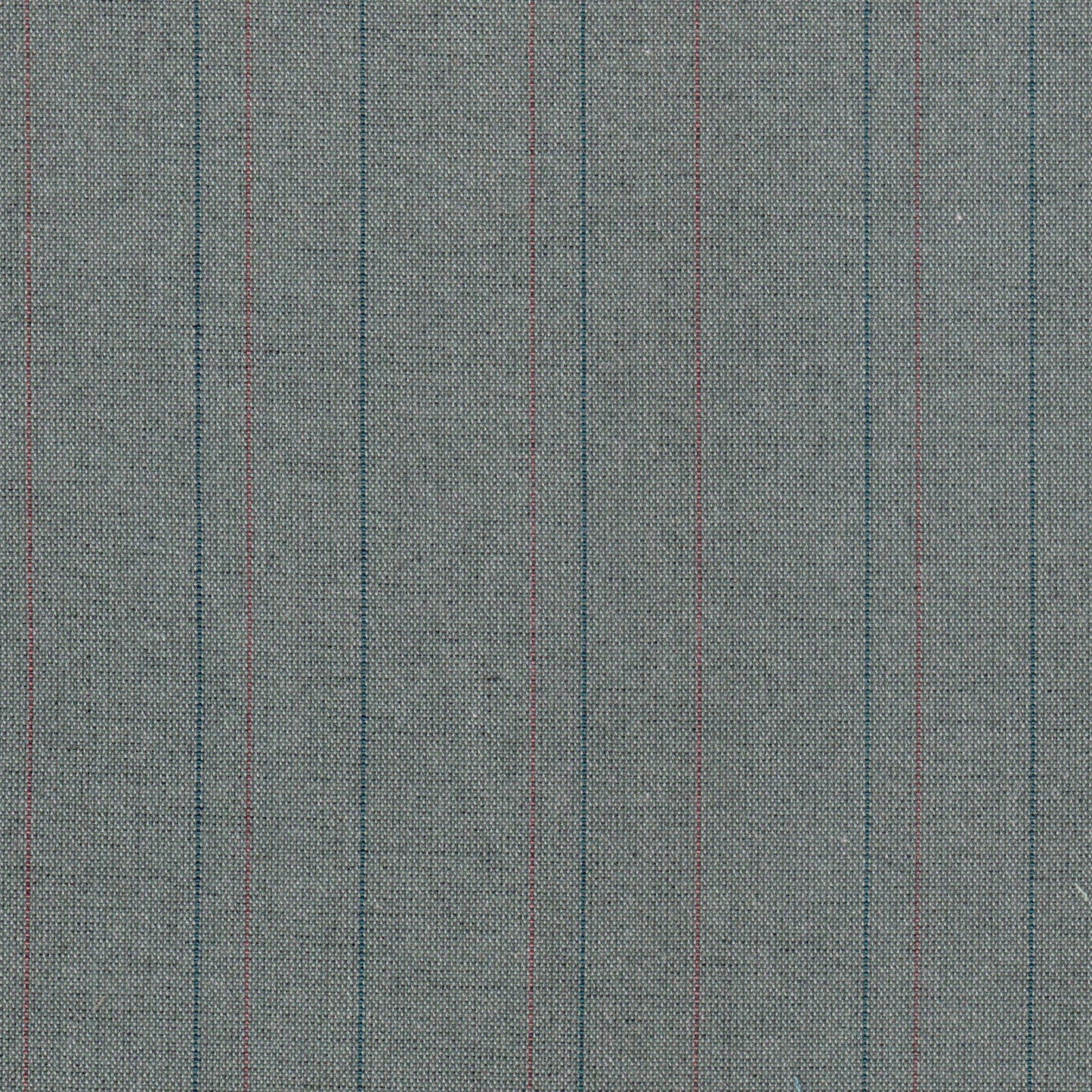 Tela jaspeada gris con líneas azules y rojas; ideal para uniformes escolares e institucionales de SchoolLine.