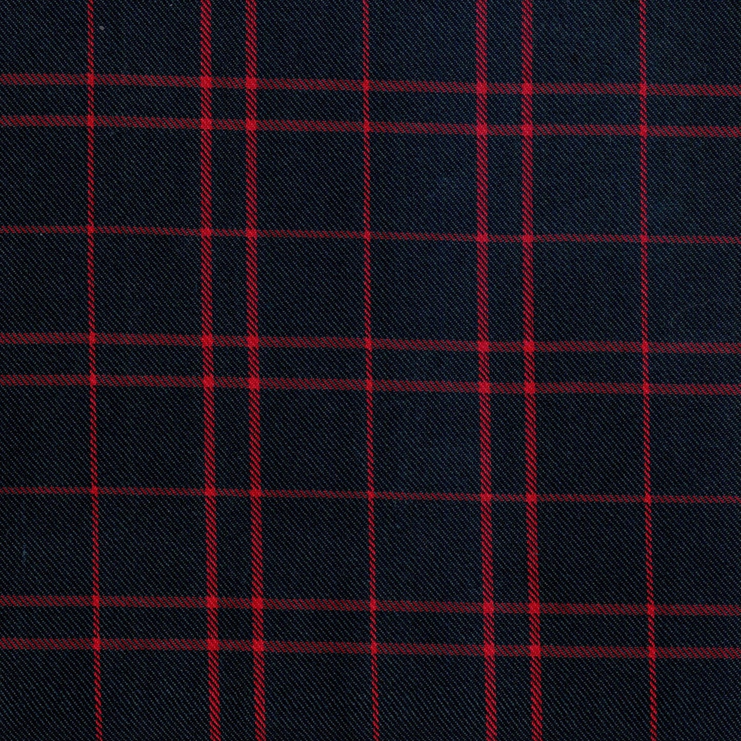 Tela jacquard diagonal azul marino con líneas rojas; Dacron, ideal para uniformes escolares SchoolLine.