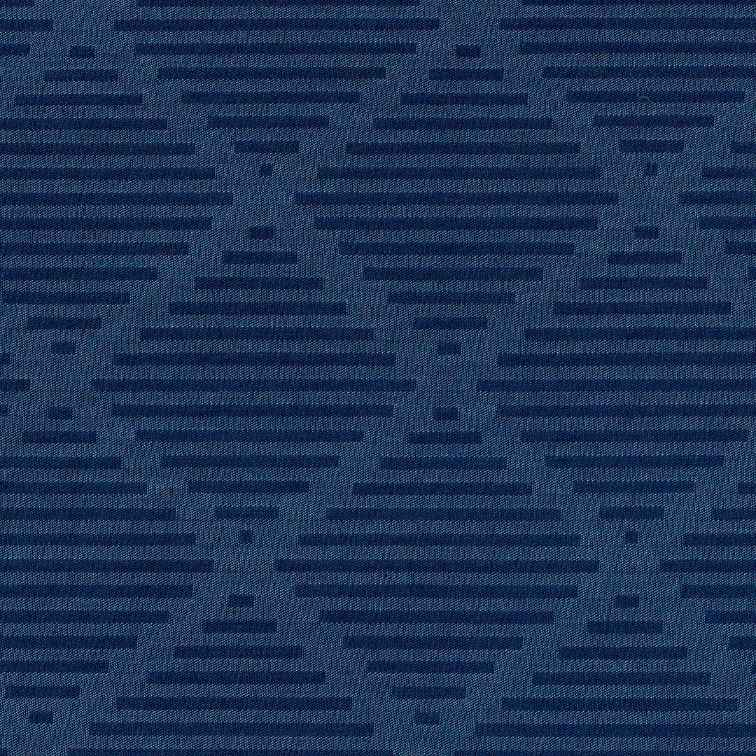 Tela indigo 66001005 de SchoolLine, tejido azul marino con patrón texturizado para uniformes escolares e institucionales.