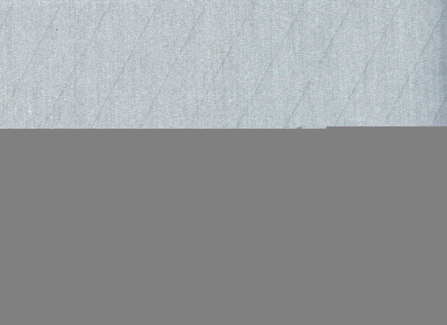 Tela indigo claro de SchoolLine; sarga diagonal azul claro para uniformes escolares e institucionales.