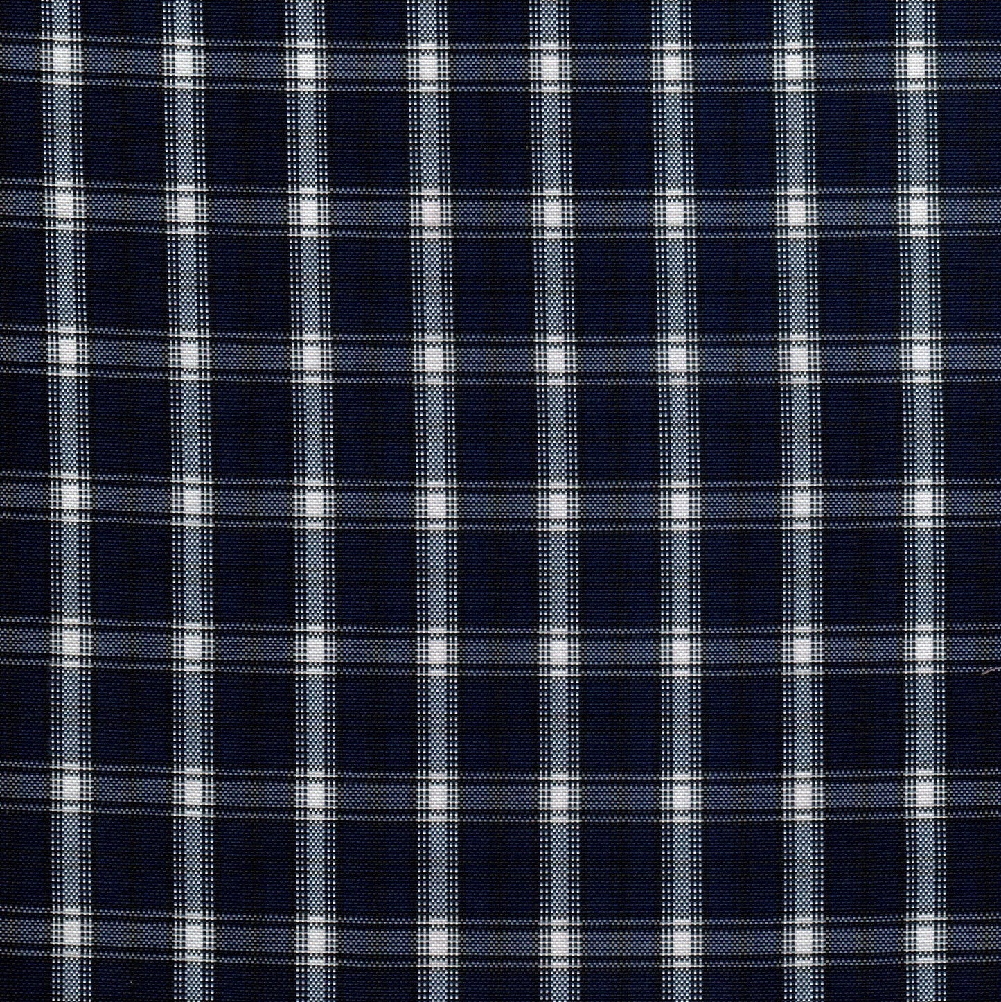 Tela escocesa de poliéster azul marino con cuadros blancos; ideal para uniformes escolares e institucionales SchoolLine.