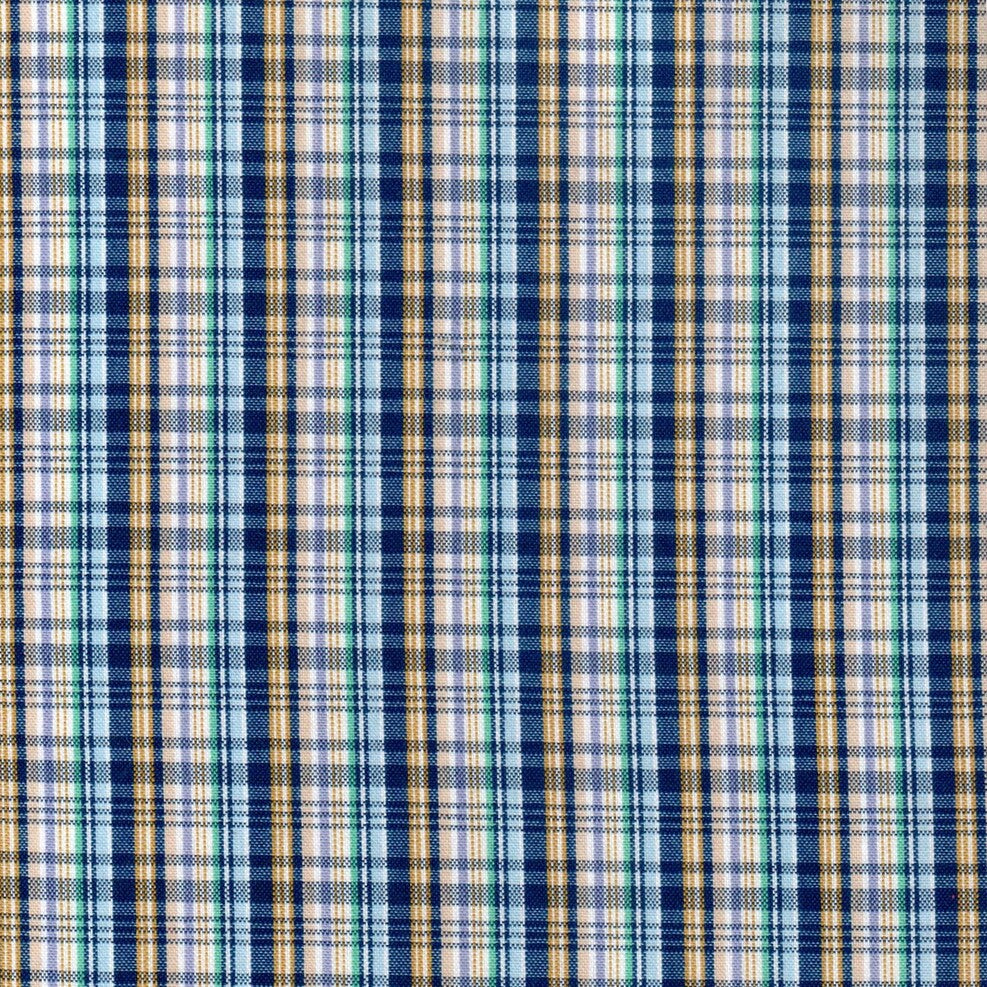 Tela escocés polidacron para uniformes escolares; azul marino, beige y blanco con líneas verdes.