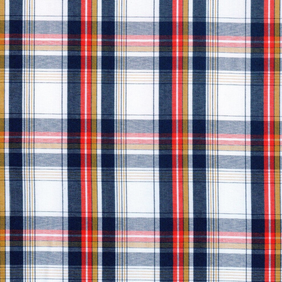Tela polidacron escocés en tartán azul marino, rojo y mostaza; ideal para uniformes escolares e institucionales.