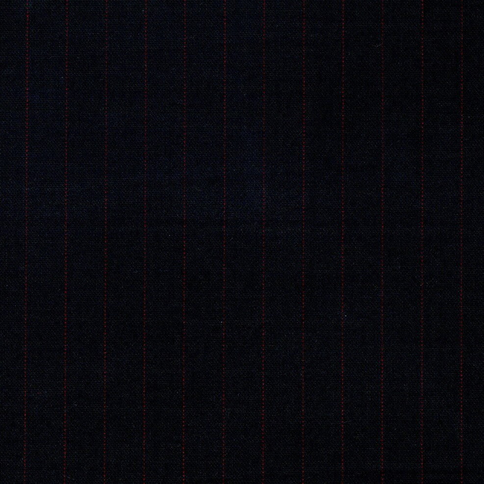 Tela Uniline escocés negro con líneas rojas verticales; ideal para uniformes escolares e institucionales (SchoolLine).