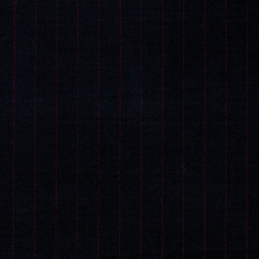 Tela Uniline escocés negro con líneas rojas verticales; ideal para uniformes escolares e institucionales (SchoolLine).