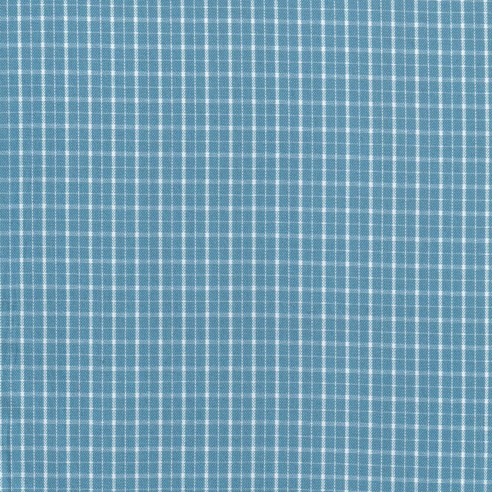 Tela para uniforme de color azul cielo con lineas blancas formando cuadros