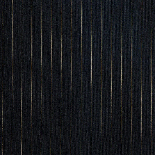 Tela para uniforme en negro con lineas amarillas decorativas