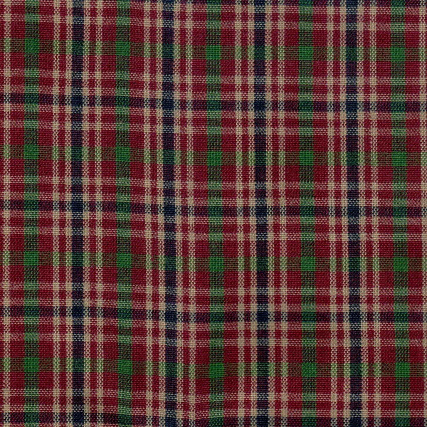 Tela Dacron SchoolLine; tejido a cuadros rojo, verde y crema en tartán para uniformes escolares e institucionales.