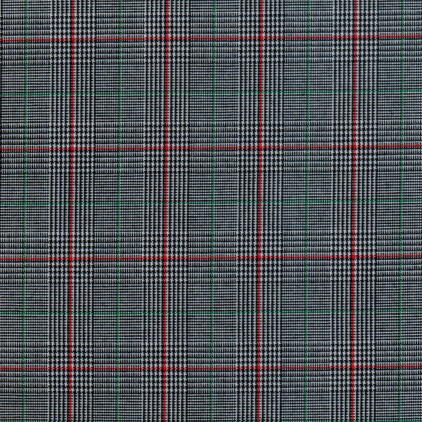 Tela 13002201 Dacron de SchoolLine, tejido tartán negro/blanco con líneas rojas y verdes; ideal para uniformes escolares.