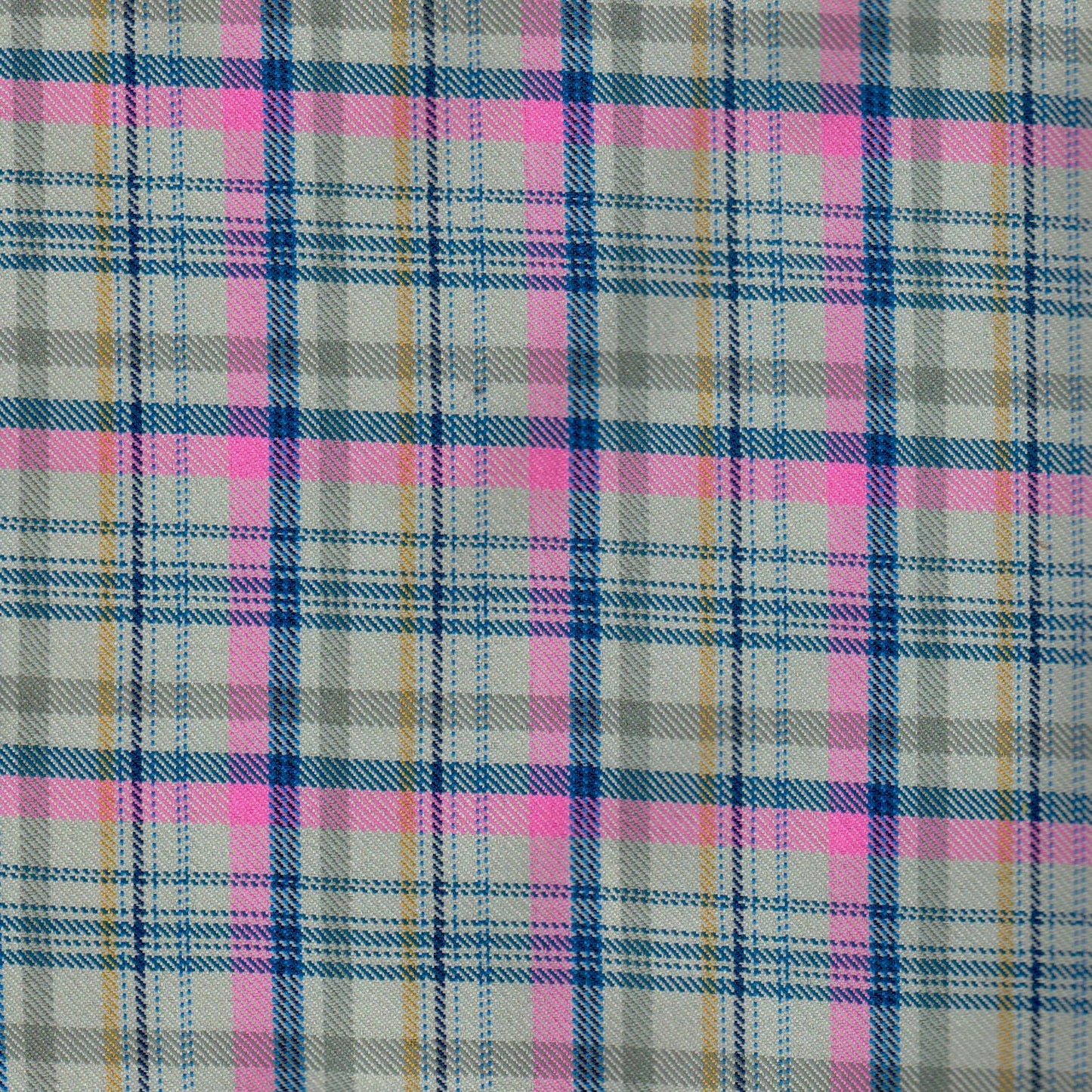 Tela diagonal de poliéster SchoolLine en cuadros rosa, azul y beige; ideal para uniformes escolares e institucionales.