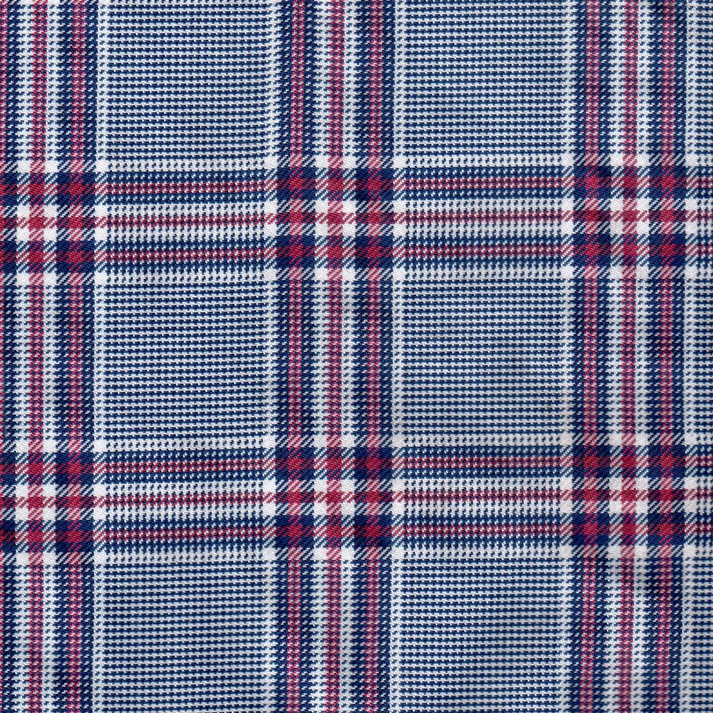 Tela diagonal de poliéster SchoolLine azul, blanco y rojo con cuadros, ideal para uniformes escolares e institucionales.