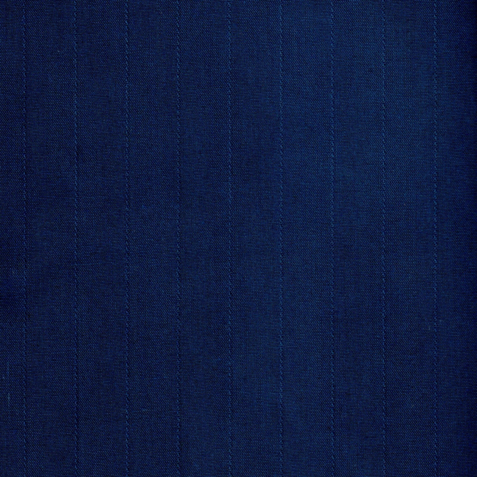 Detalle de la tela Jacquard Tatefan 65-005, con textura definida para confección institucional de alta calidad