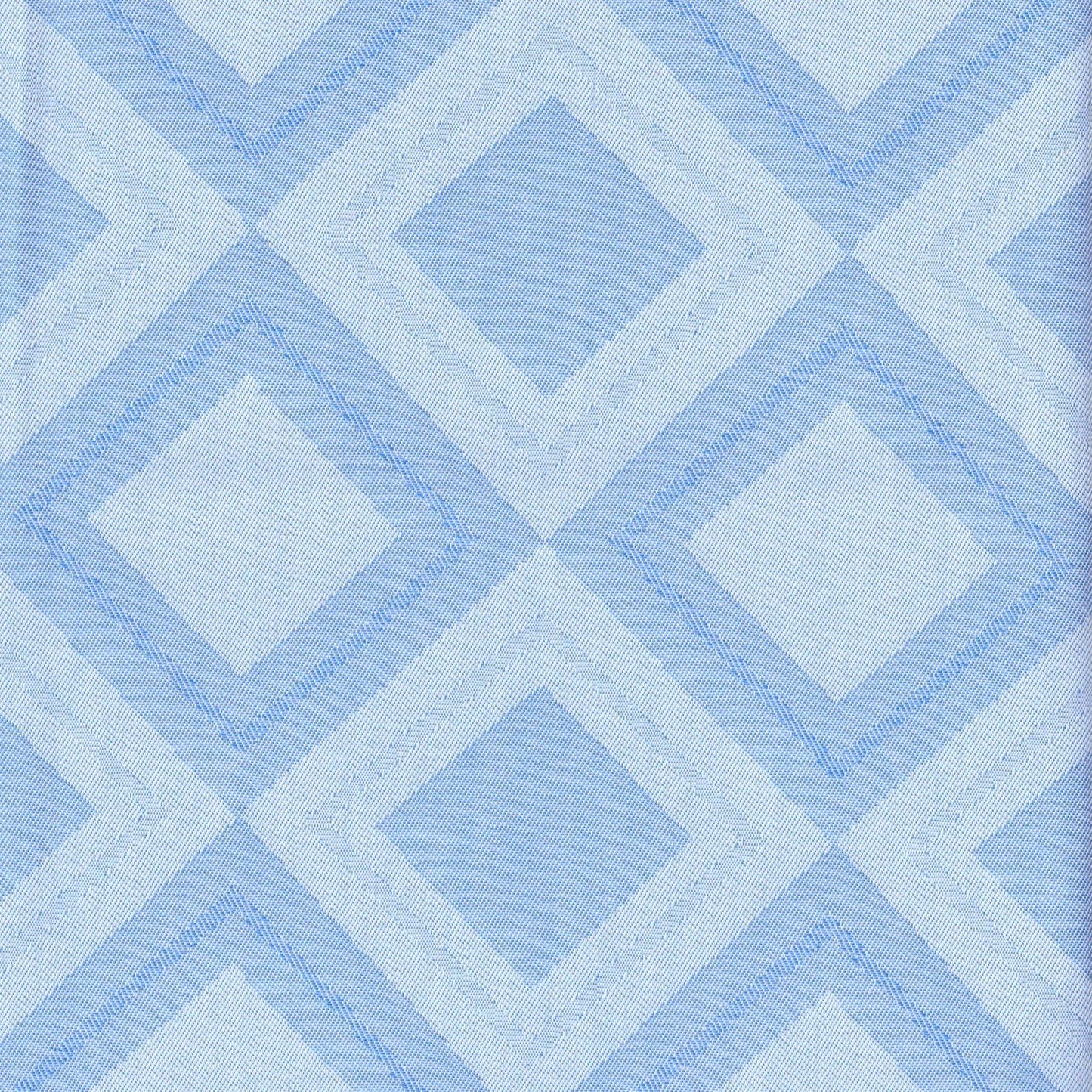 Tela 66002014 Indigo clear para uniformes escolares e institucionales, azul índigo claro con patrón romboide.