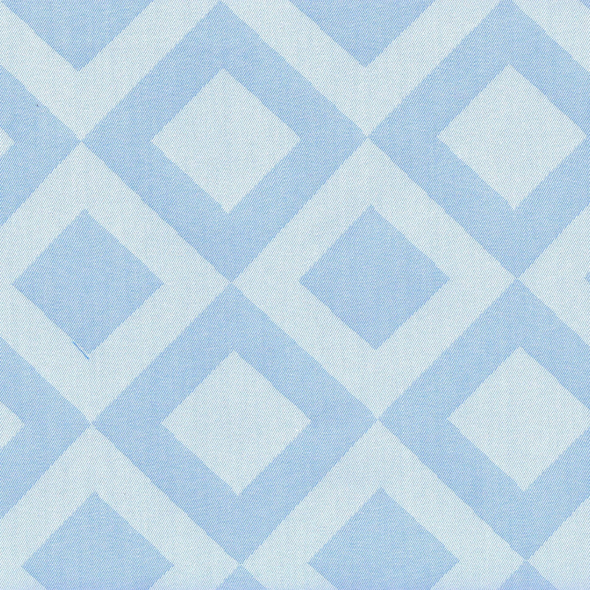 Tela Indigo claro con patrón de rombos azul y blanco; ideal para uniformes escolares e institucionales SchoolLine.