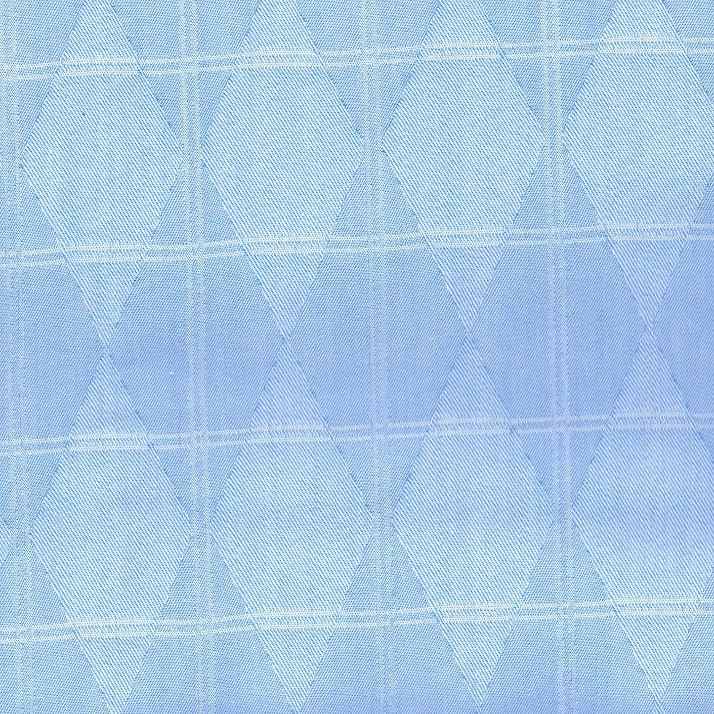 Tela indigo claro SchoolLine con patrón de rombos y líneas, ideal para uniformes escolares.