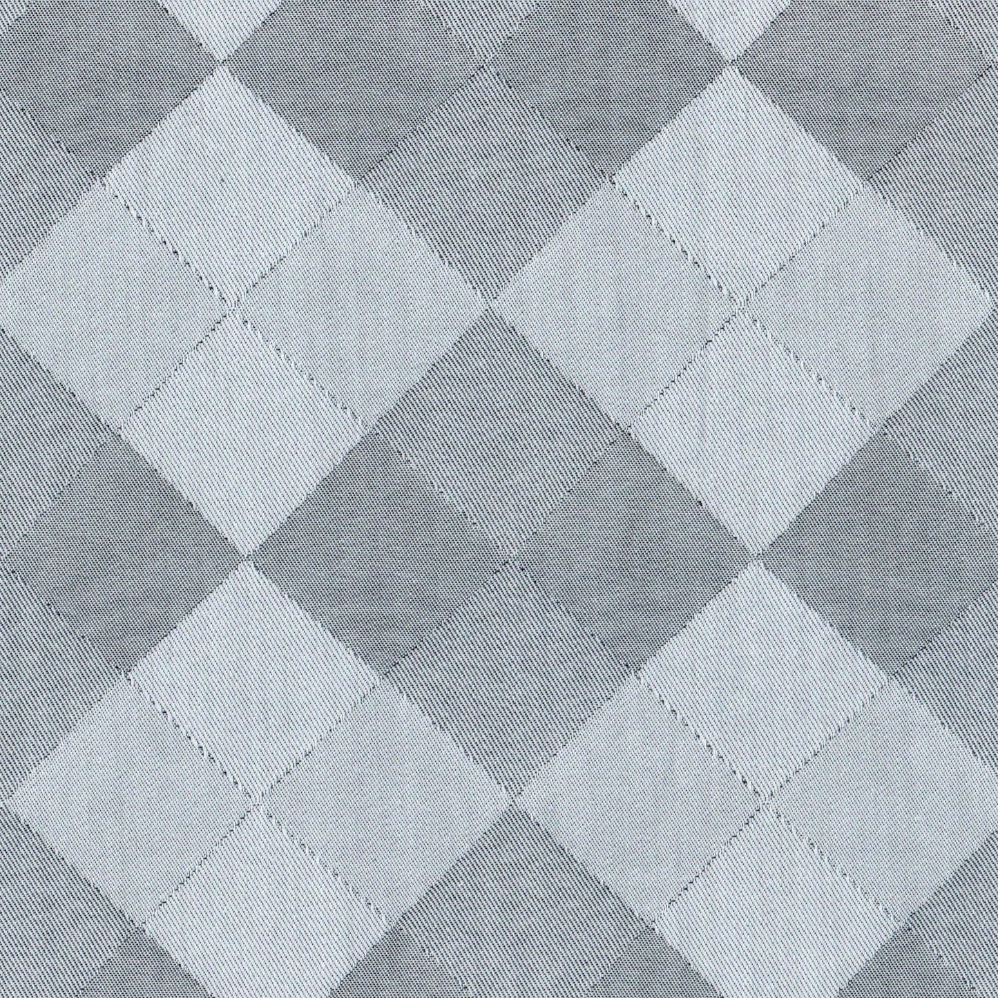 Tela Indigo clear gris con patrón de rombos en cuadros; ideal para uniformes escolares e institucionales SchoolLine.