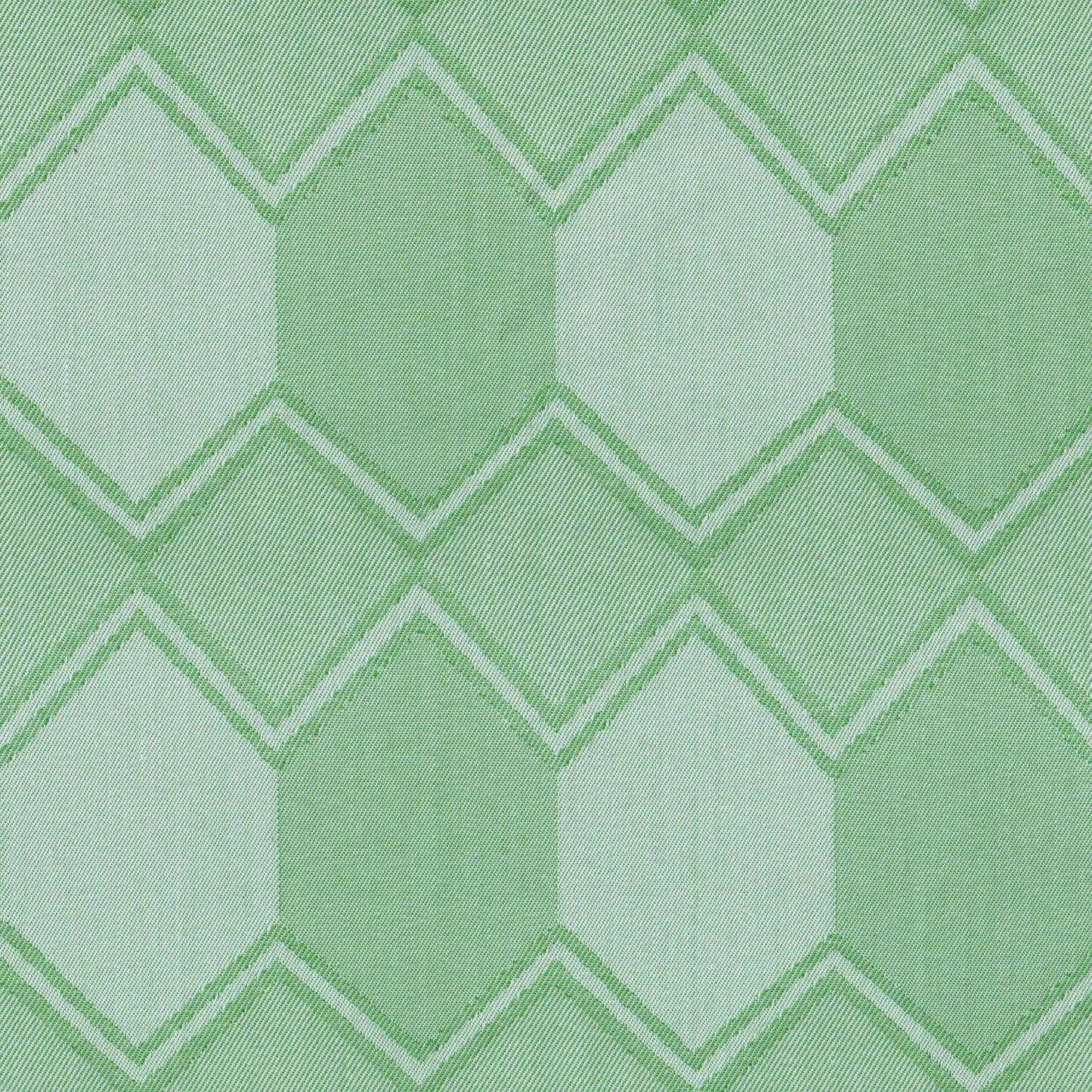 Tela para uniforme SchoolLine en verde claro y verde esmeralda con rombos en zigzag, ideal para uniformes escolares.