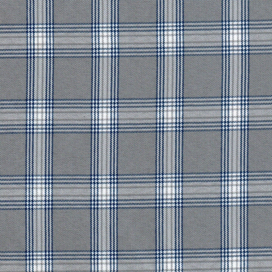Tela escocesa de poliéster SchoolLine, azul marino y blanco a cuadros, ideal para uniformes escolares.