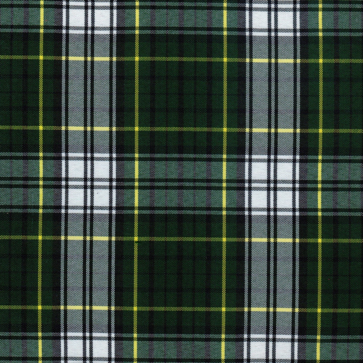 Tela escocesa de poliéster SchoolLine en verde oscuro con cuadros blancos y amarillos, ideal para uniformes escolares.