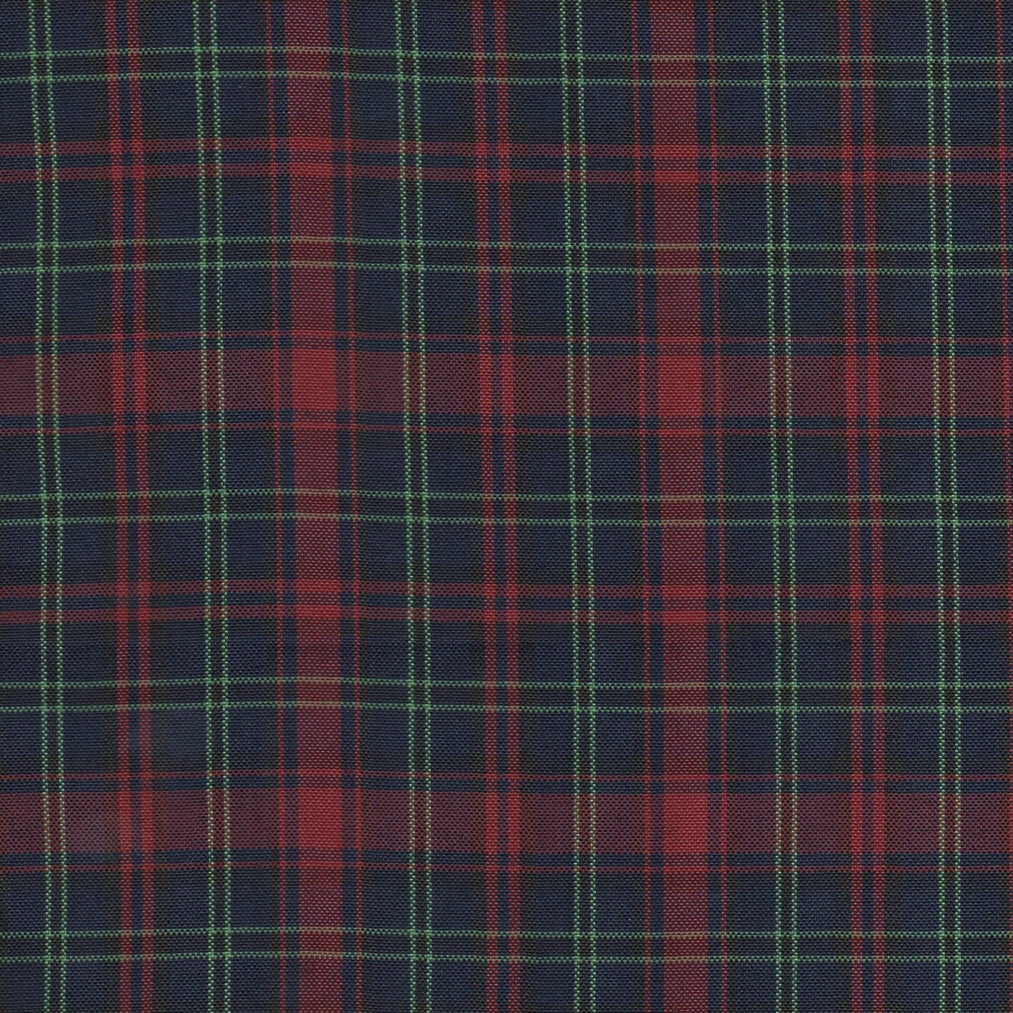 Tela escocesa de poliéster SchoolLine en azul marino con cuadros rojos y líneas verdes, perfecta para uniformes escolares e institucionales.